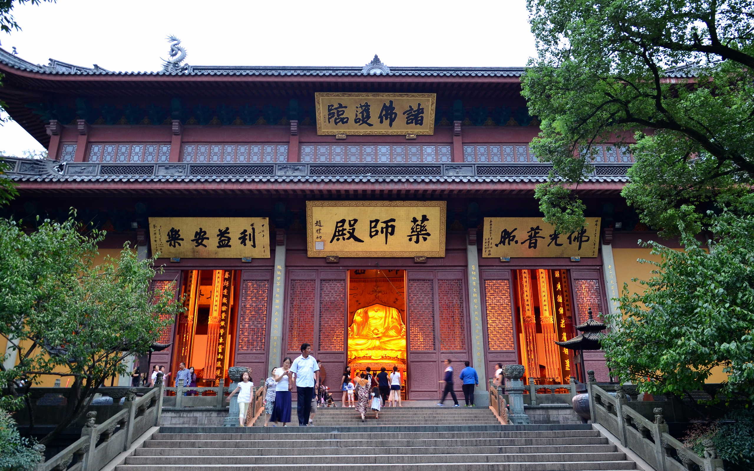 Roof line and courtyard of Lingyin Temple in the wooded hills northwest of West Lake